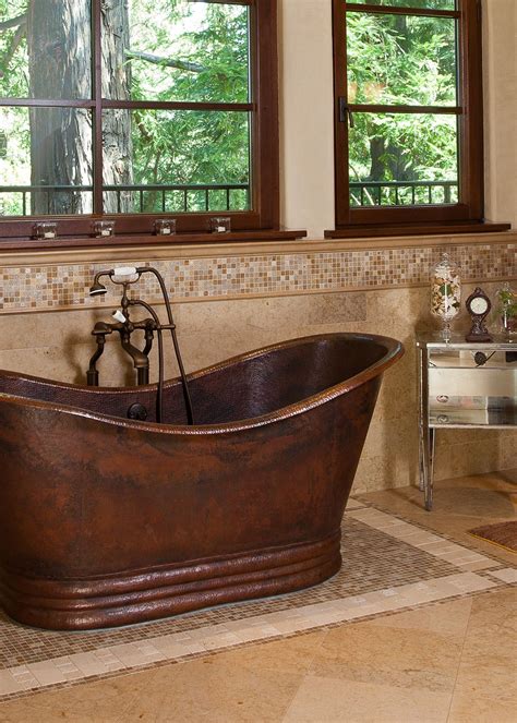 Master Bath Features Free Standing Copper Tub On Mosaic Tile Stone