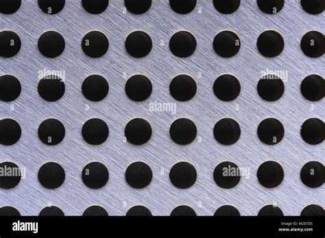 Close Up Of Metal Background Texture With Holes Stock Photo Alamy