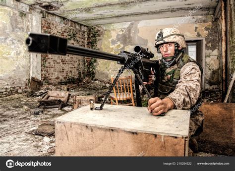 Marine Corps sniper with large caliber rifle — Stock Photo © zabelin ...