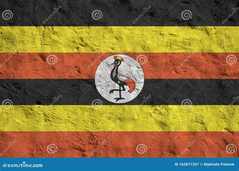 Uganda Flag Depicted In Bright Paint Colors On Old Relief Plastering