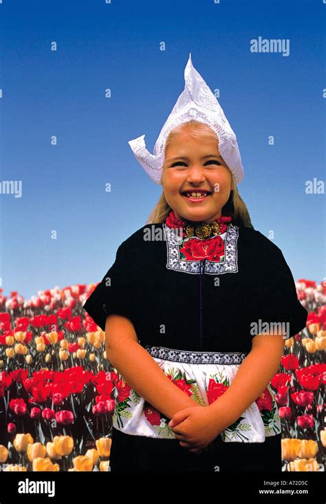 Young Girl In Traditional Dutch Costume Holland Netherlands Stock Photo