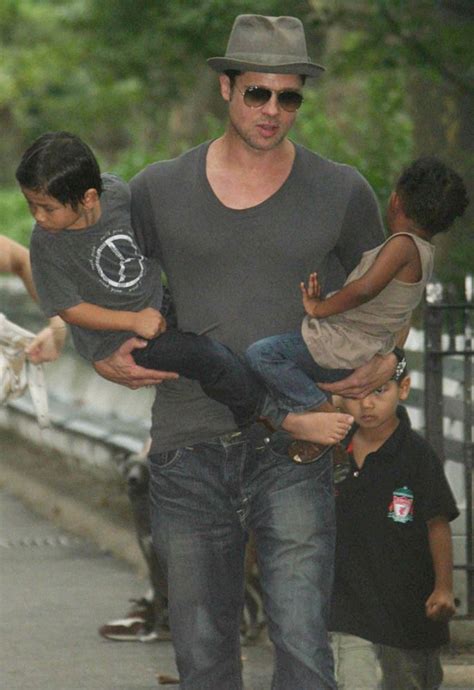 New York, NY 8-26-07 Brad Pitt leaving the playground with his kids ...