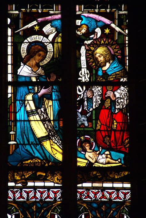 A Stained Glass Window Depicting The Birth Of Jesus