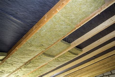 Thermal Insulation Mineral Rock Wool Installation at the New Building Attic Ceiling Stock Image ...