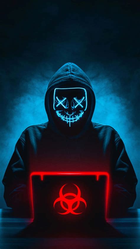 Download Cybersecurity_ Concept_ Hacker_with_ Glowing_ Mask_and_ Laptop ...