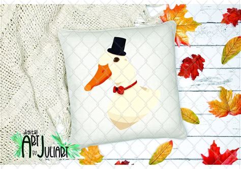 a white pillow with a duck wearing a top hat