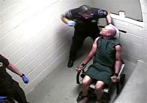 Calhoun County Corrections Officer Resigns Jail Video Shows Him Punching Restrained Inmate