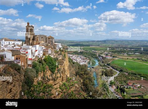 Aerial View Of Arcos De La Frontera With San Pedro Church And Guadalete