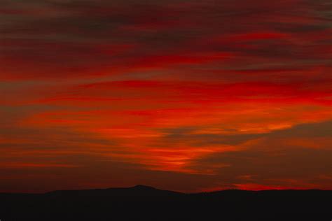 Red Sunrise Over Big White Mountain Photograph by Laura Tucker