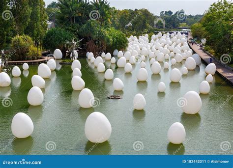 SINGAPORE-November 25, 2019: Installation of White Eggs Floating in Water. Eggs are among Seven ...