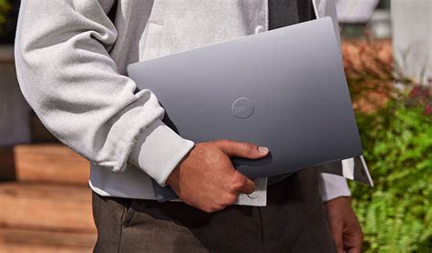 dell  launch  laptops  qualcomm processors   market