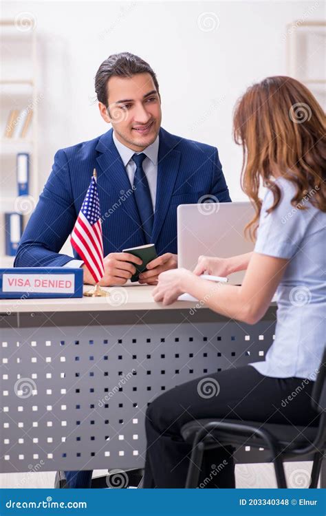 Young Woman Visiting American Embassy for Visa Stock Photo - Image of ...