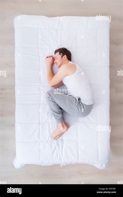 Handsome Man Sleeping In Bed Stock Photo Alamy