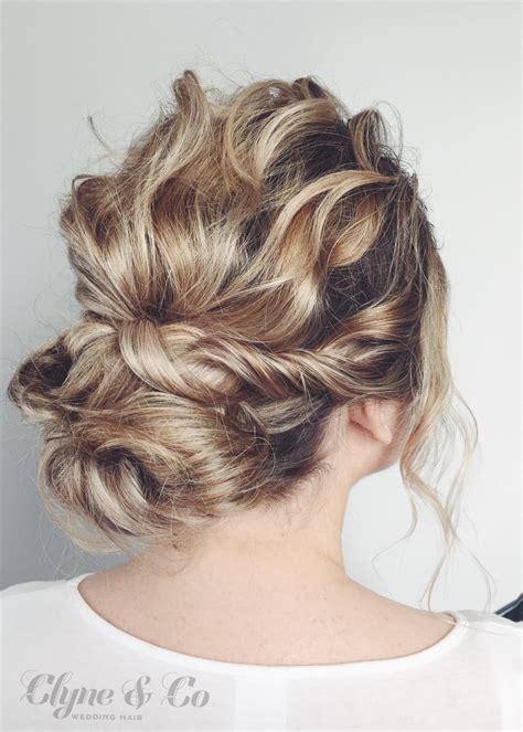 Textured Wavy Low Bun With A Bit Of A Twist Gorgeous Bridal Hair