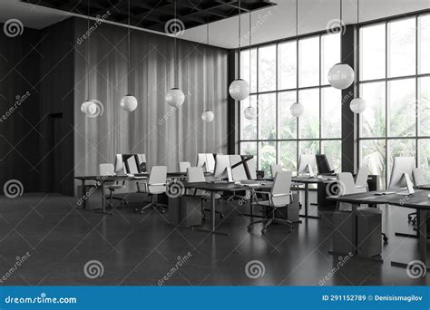 Dark Workspace Interior With Desk And Pc Monitors In Row Panoramic