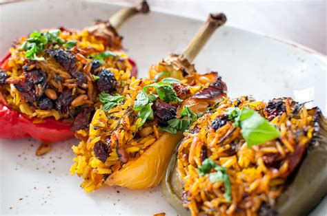 Stuffed Peppers With Herbed Rice Raisins And Sun Dried Tomato