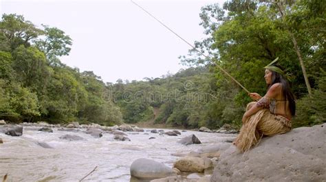 Tribe Woman Fishing in River Stock Video - Video of female, flowing ...