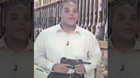 Bryce Williams -- Holding Submachine Gun In News Report