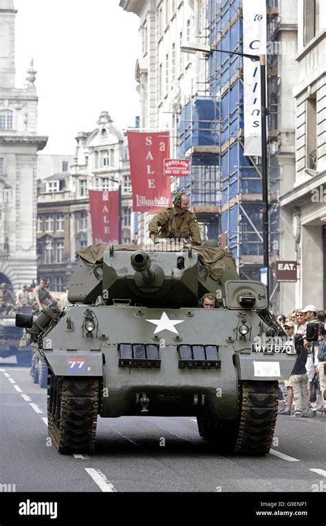 A British Destroyer tank is driven in a parade showcasing 100 years of ...