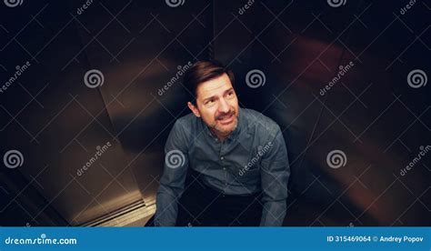man suffering  claustrophobia trapped  stock photo image