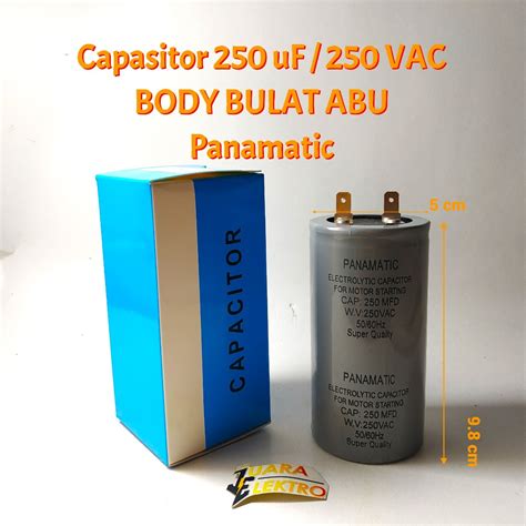 Jual CAPASITOR 250 UF 250 VAC Bulat Abu Abu Panamatic Kapasitor