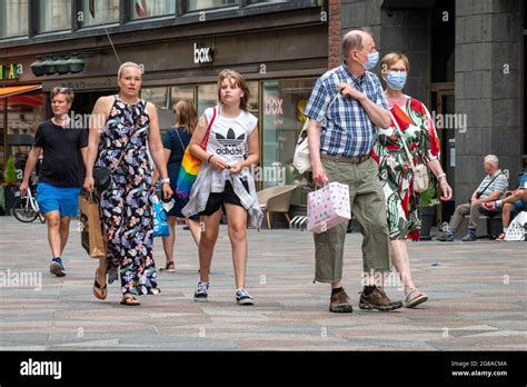 People passing through Keskuskatu in Helsinki, Finland Stock Photo - Alamy