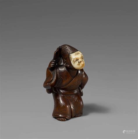 51BidLive A Wood And Ivory Netsuke Of A Dancer Mid 19th Century