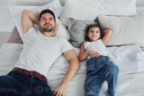 Happy Father With His Daughter Spending Free Time At Home Together