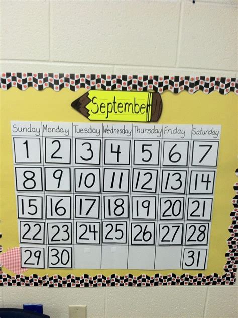 a bulletin board with the calendar on it