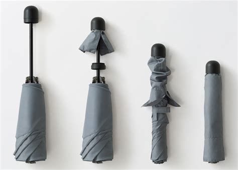 Nendo S Latest Umbrella Hides A Cover In Its Handle