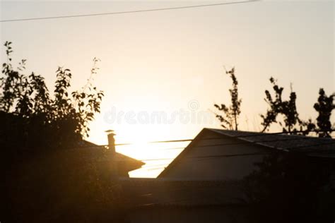 Sunset Behind Old Housessunset Behind Old Houses Stock Photo Image