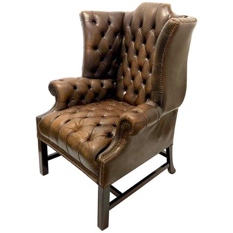 Antique Chesterfield Tufted Distressed Leather Tall Wingback Chair In