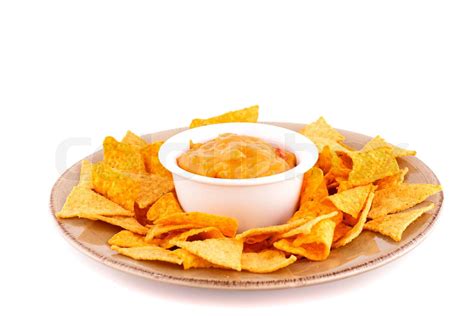 Nachos og ost sauce isoleret på hvid baggrund Stock foto Colourbox