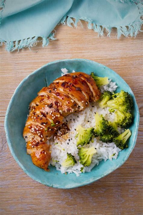 Glased Chicken Breast Rice And Broccoli As Garnish Chicken In