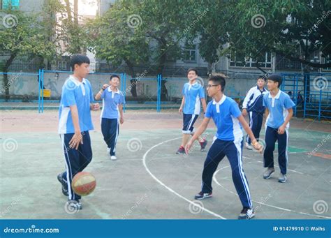 Shenzhen China Middle School Students Playing Basketball Editorial