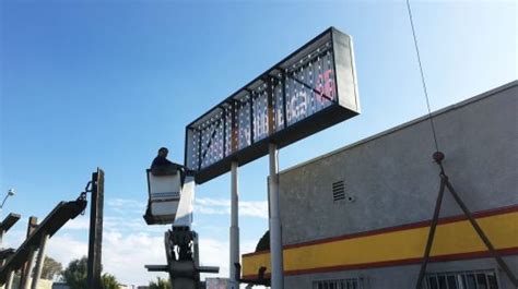 The process of installation of a pylon sign | Front Signs