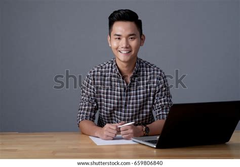 Waistup Portrait Friendly Vietnamese Manager Sitting Stock Photo