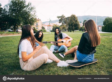 Four Amazing Fun Girl Friends Hanging Out Park Laughing While Stock ...