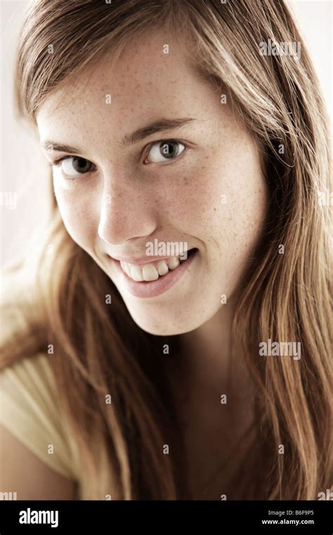 Teenage girl, woman, 17 years-old, smiling, portrait Stock Photo - Alamy