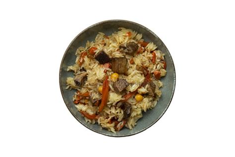 A Traditional Dish Of Rice And Meat Pilaf In A Plate Stock Image