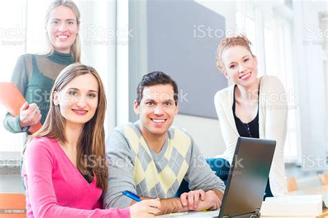 College Students In Teamwork Learning Stock Photo Download Image Now