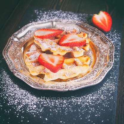 Homemade Classic Belgian Waffles Topped With Fresh Strawberry And