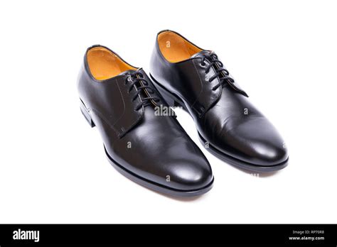 Black shoes isolated on white background Stock Photo - Alamy