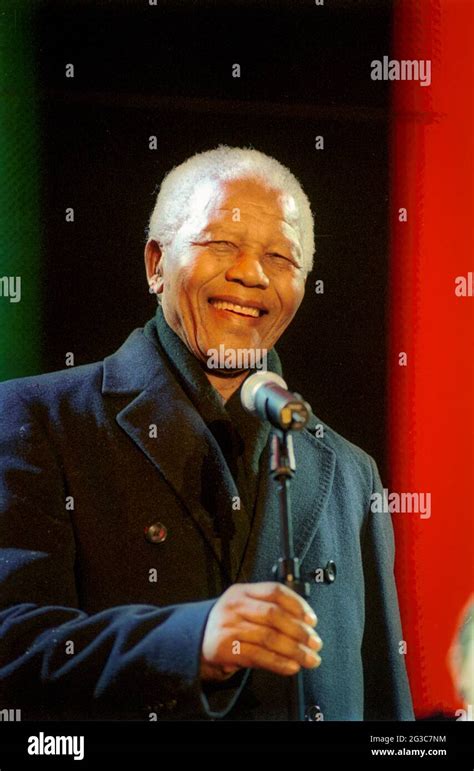 Nelson Mandela with microphone smiles to the crowd at the Celebrate ...