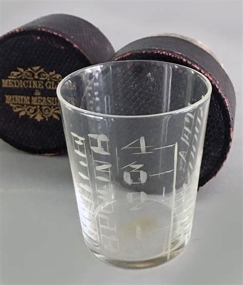 Medicine Glass And Minim Measure