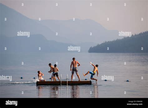 Young Boys Playing On Slocan Lake New Denver Slocan Valley West