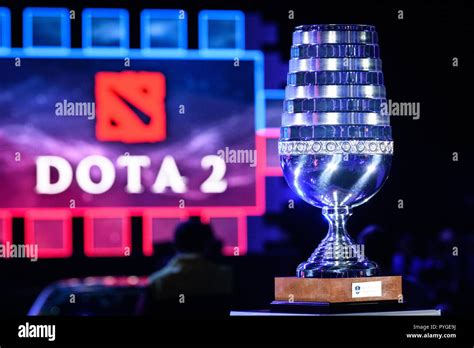 The ESL Trophy In Front Of The Dota 2 Logo GES ESport ESL One