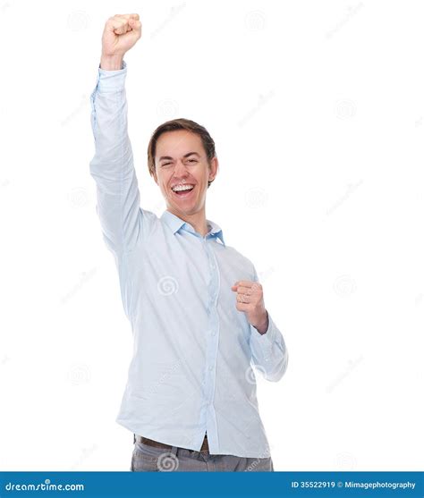 Portrait Of A Happy Cheerful Man With Arms Raised In Celebration Stock