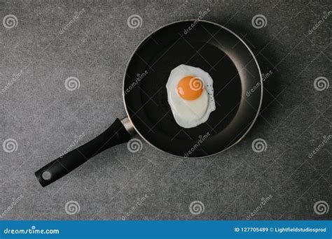 Top View Of Frying Pan With Tasty Fried Egg On Grey Stock Image Image Of Yolk Frying 127705489