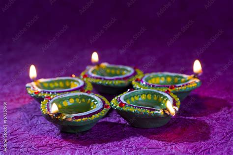 Clay diya lamps lit during Diwali Celebration. Greetings Card Design ...